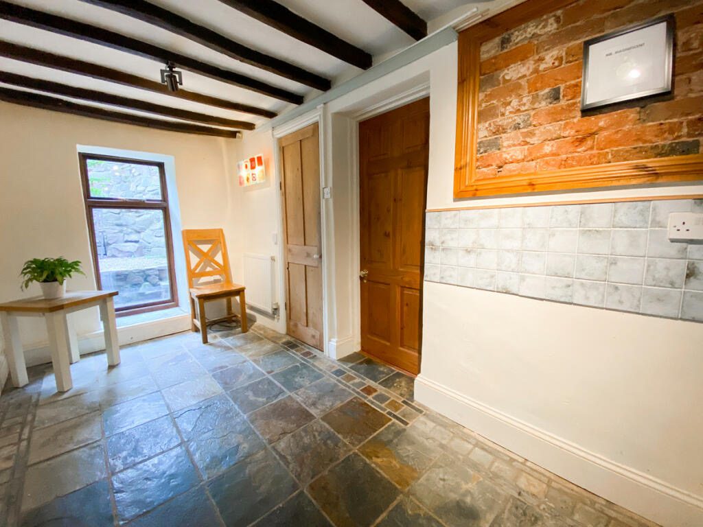 Downstairs Hallway in April 2023