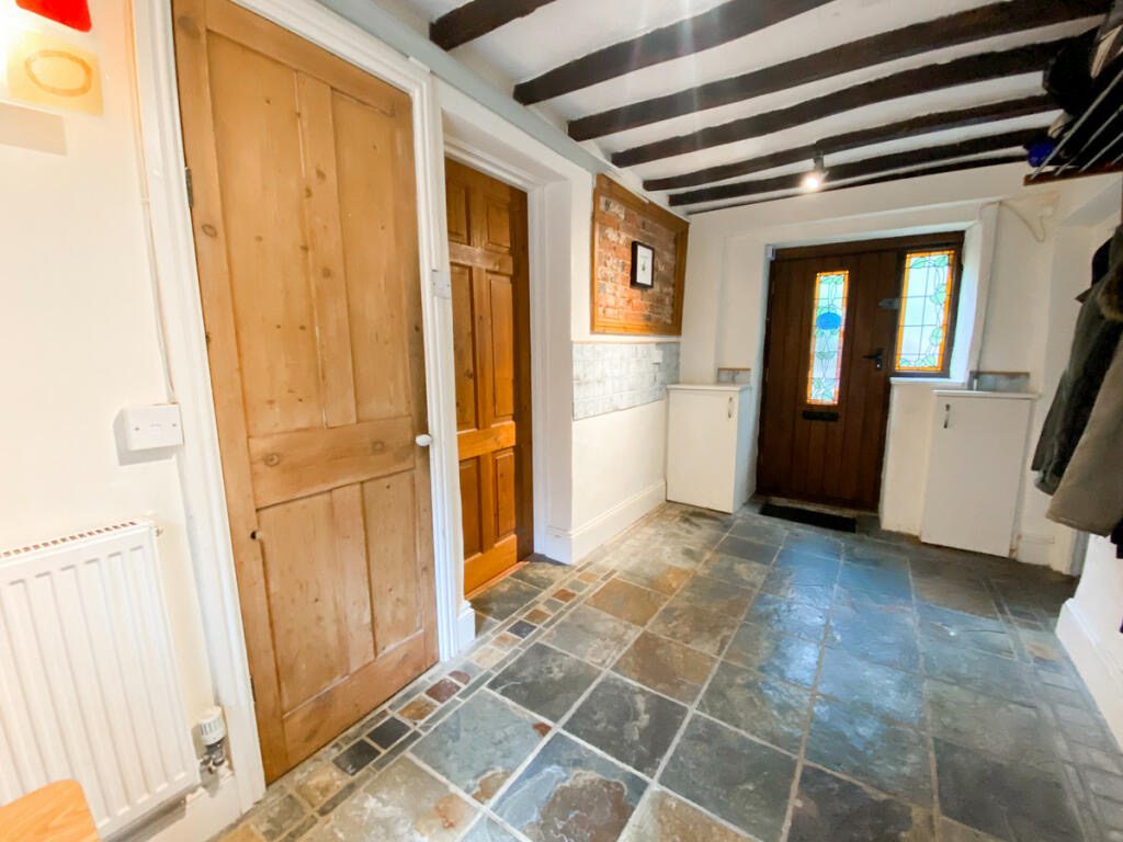 Downstairs Hallway in April 2023