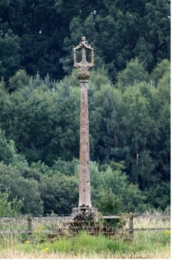 The original medieval Buttercross, now standing in the grounds of Swithland Hall