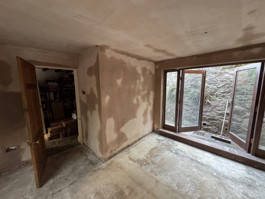 Ceiling re-boarded and walls re-plastered