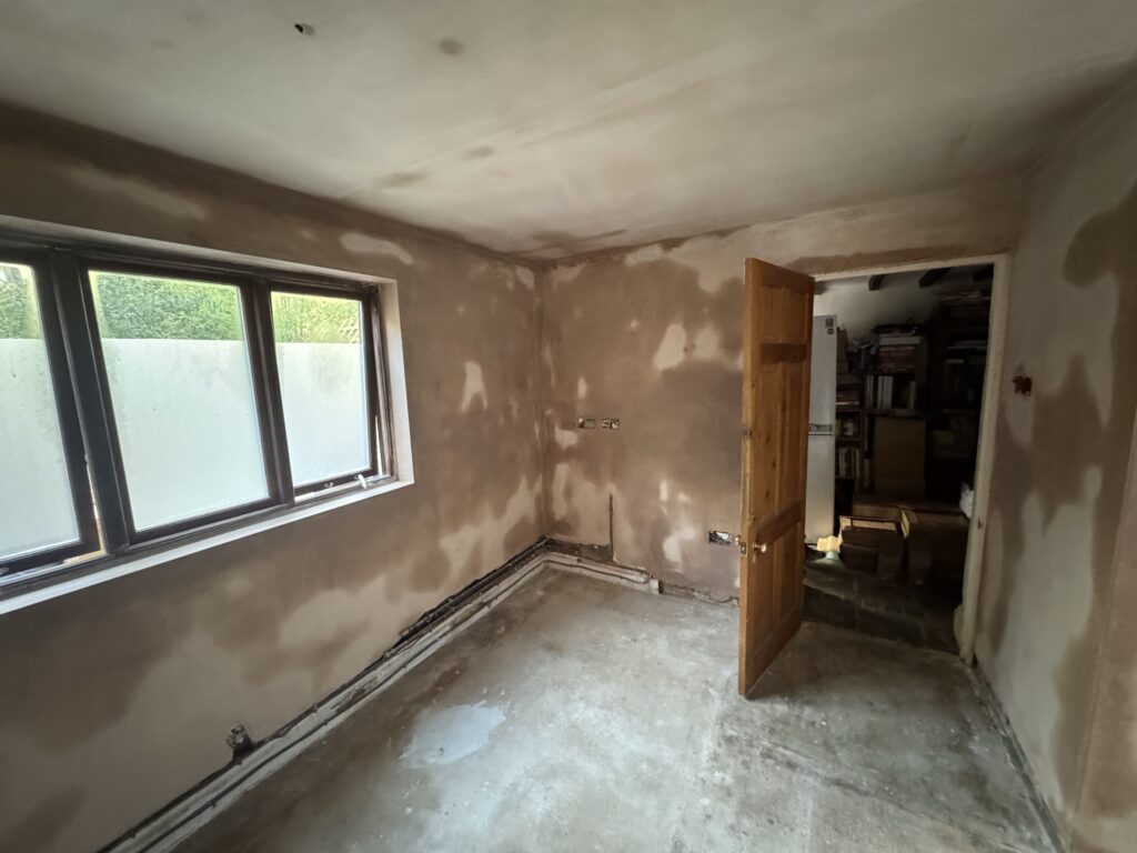 Ceiling re-boarded and walls re-plastered