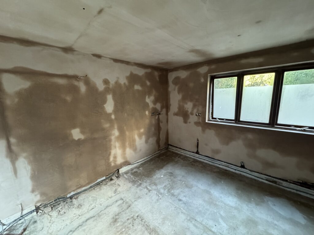 Ceiling re-boarded and walls re-plastered