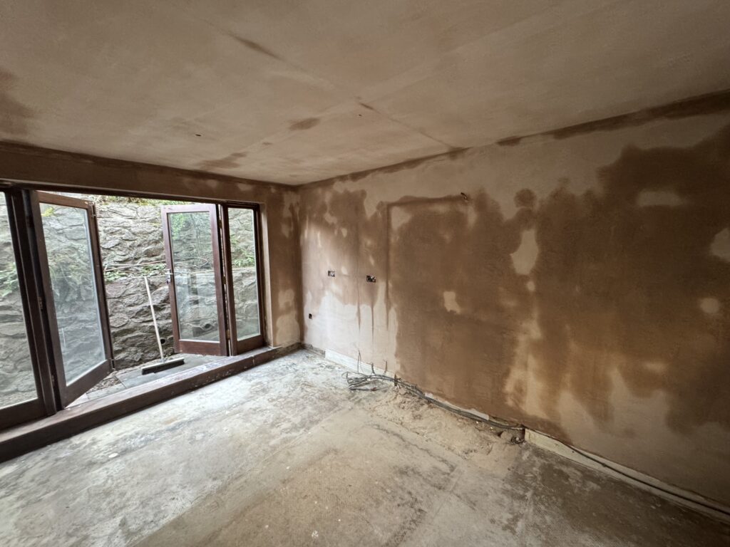 Ceiling re-boarded and walls re-plastered