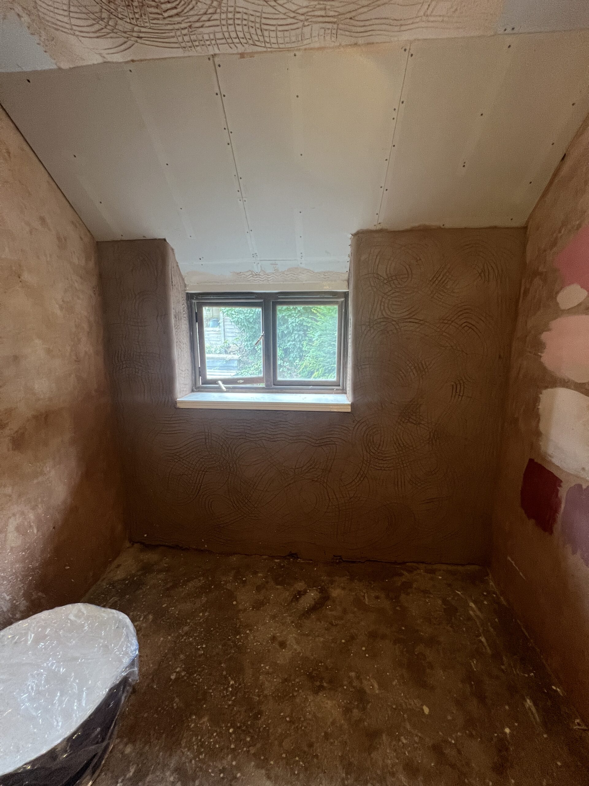 Ceiling re-boarded and base layer of lime aplied