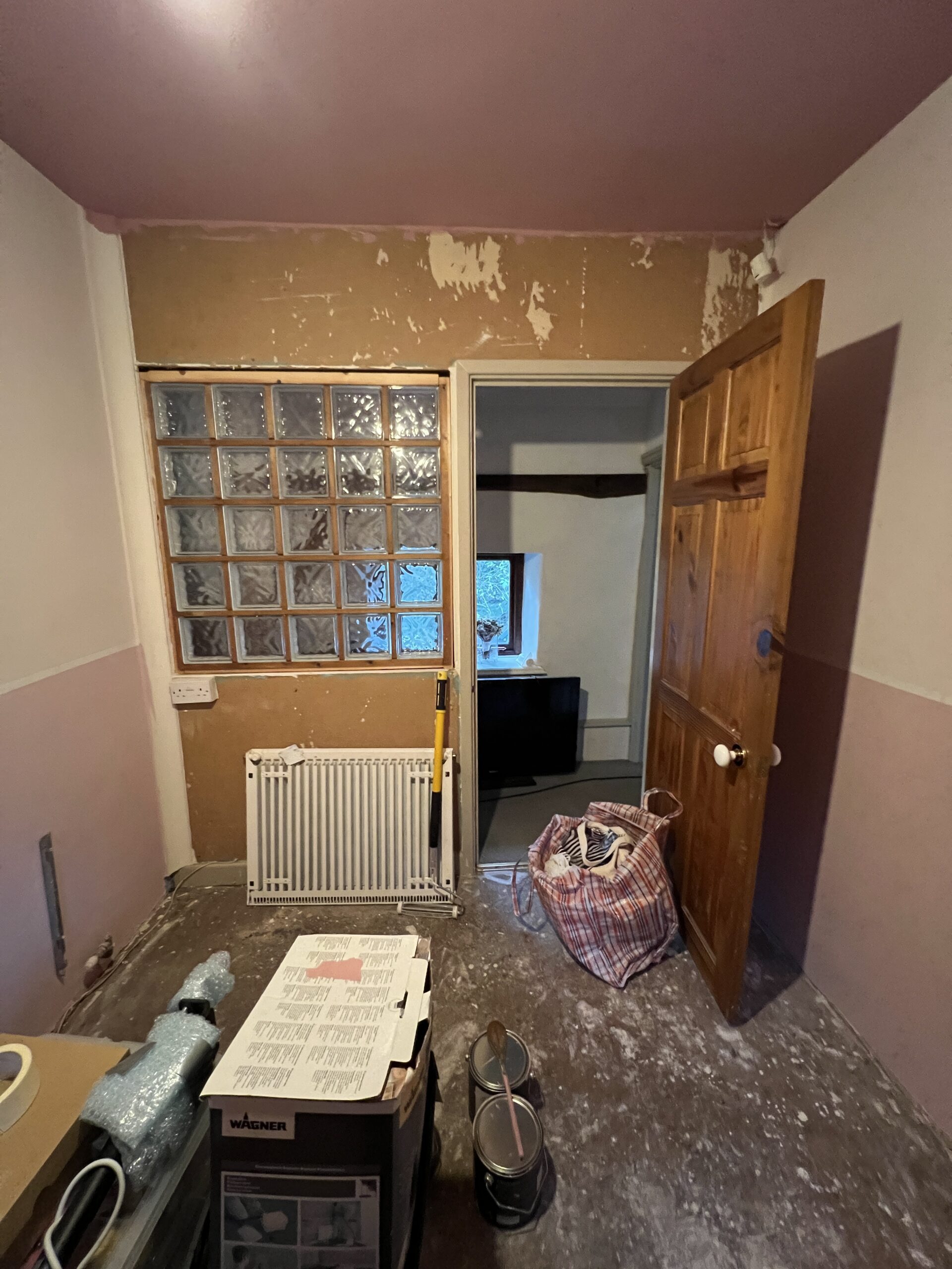 The remaining fourth wall - a modern studwall addition