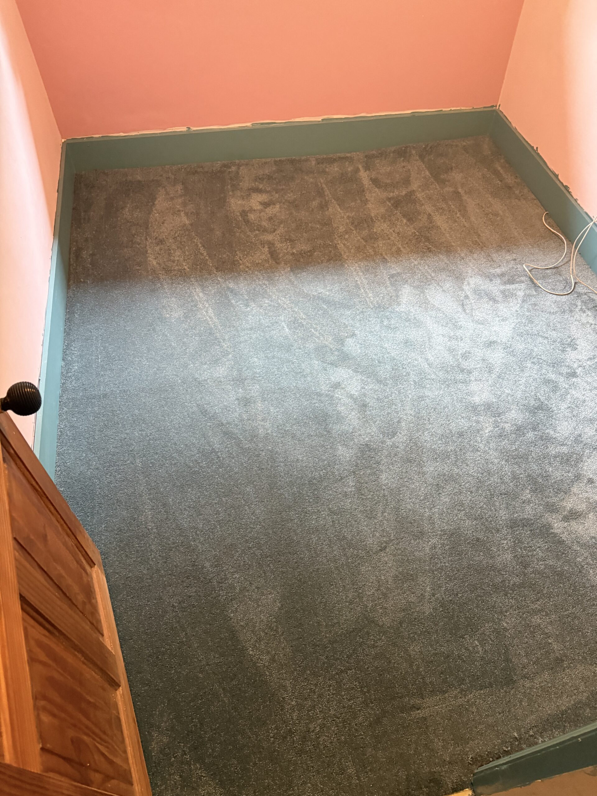 Teal carpet fitted
